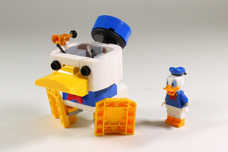 It’s a Mecha Face-Off With The Custom LEGO Mecha Donald Robo!